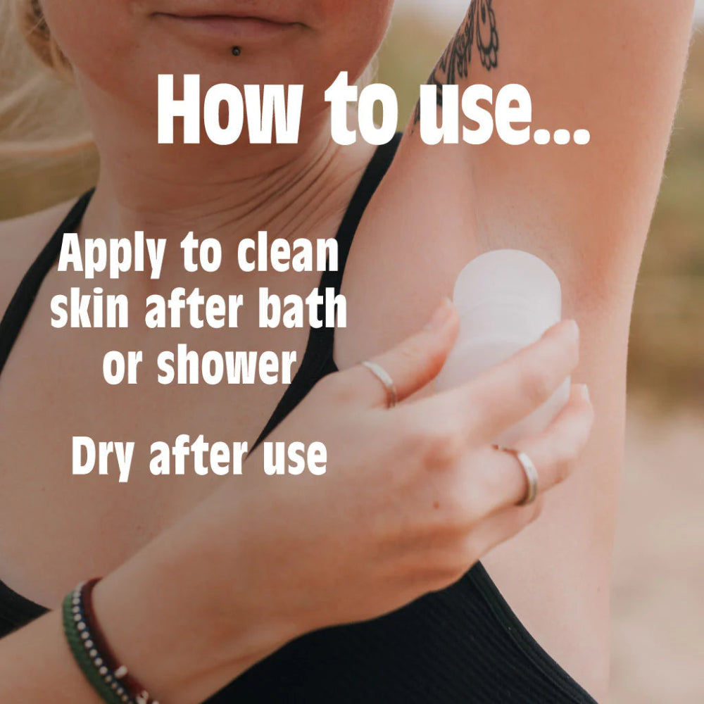 Person applying a product to their arm with text on how to use it.