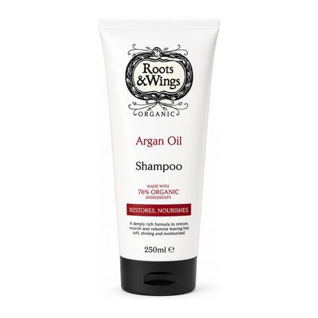 Roots and Wings Organic Argan Oil Shampoo by Roots & Wings Natural Beauty — front view showing product label and branding, studio product photo on white background