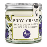 Laughing Bird Shea & Cocoa Butter Body Cream (with Moringa & Bilberry) by Laughing Bird Natural Beauty — front view showing product label and branding, studio product photo on white background