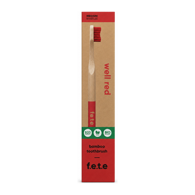 From Earth to Earth Bamboo Toothbrush "Well Red" - Red Medium 1 Unit by f.e.t.e Personal Care — front view showing product label and branding, studio product photo on white background
