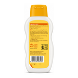 Weleda Calendula Baby Oil Fragrance Free — back view showing ingredients and product details, studio product photo on white background