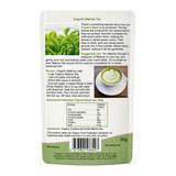 Greens Organic Matcha Tea — back view showing ingredients and product details, studio product photo on white background